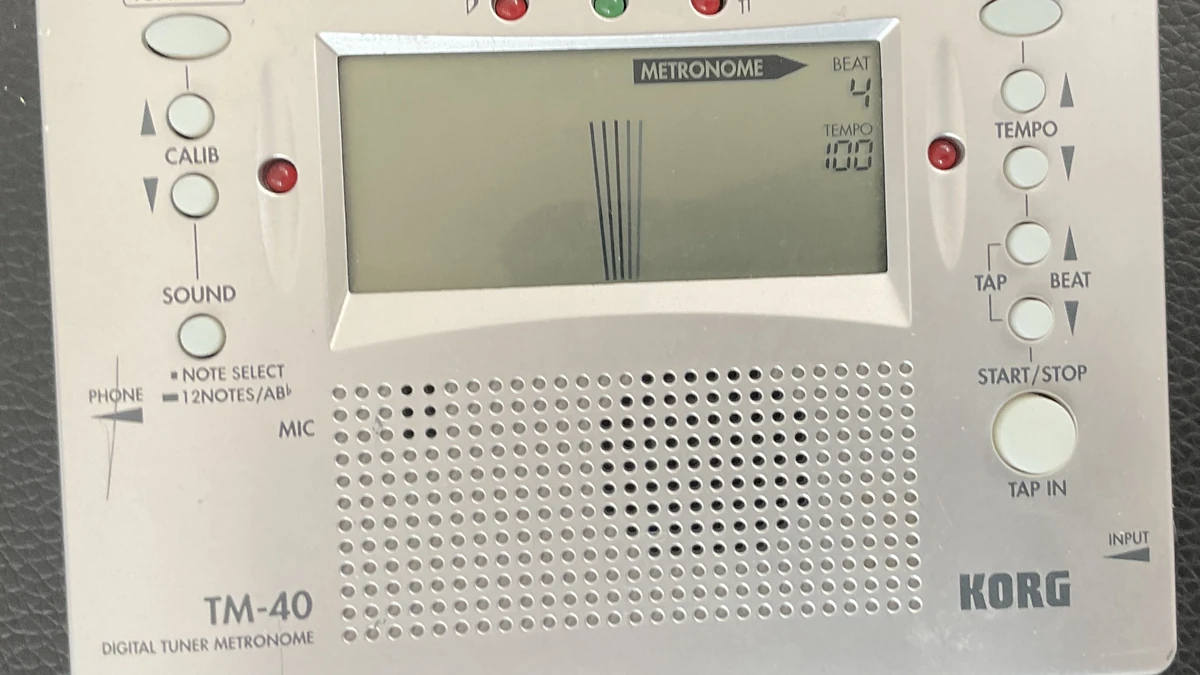 Korg TM-40 digital tuner and metronome with its display and tempo buttons